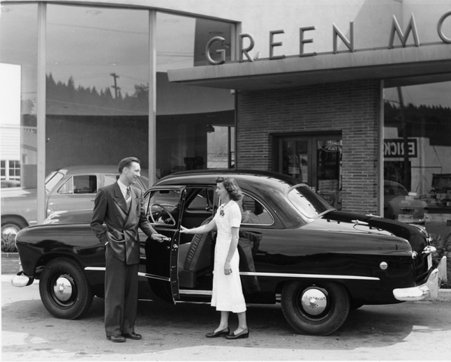 Ron Green selling a new 1949 Ford at Green Motors